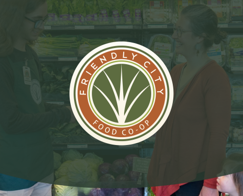 Friendly City Food Co-Op logo on top of green transparency and image in grocery aisle